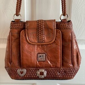 M.C Vintage Western M.C. Pure leather purse with long straps,excellent condition